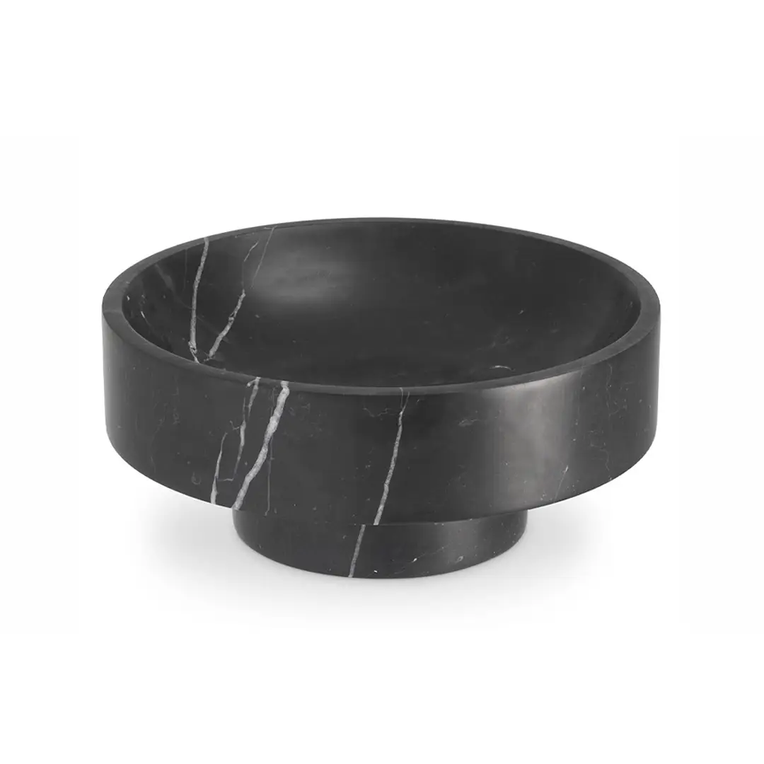 Black marble bowl with white veins on white background