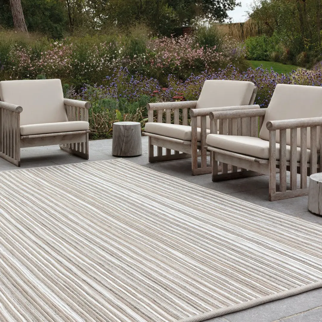 Outdoor seating arrangement with garden background