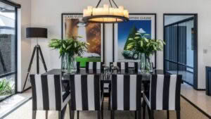 Modern dining room with striped chairs and stylish decor