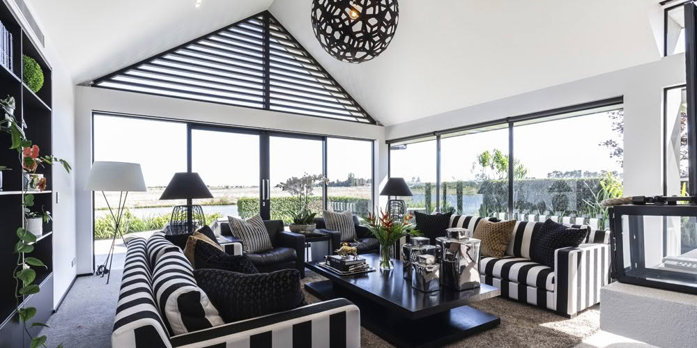 Stylish living room with lake view and modern decor