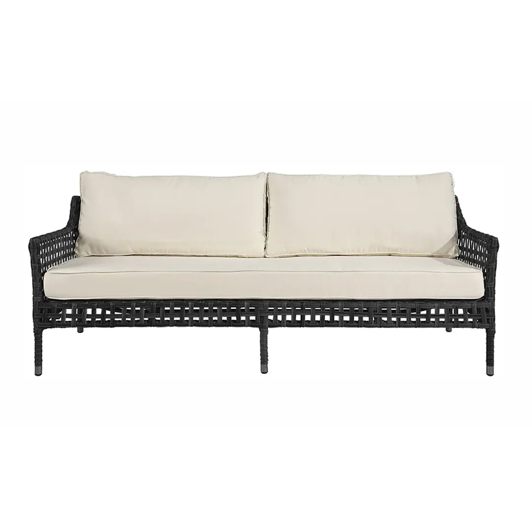 Black wicker sofa with beige cushions