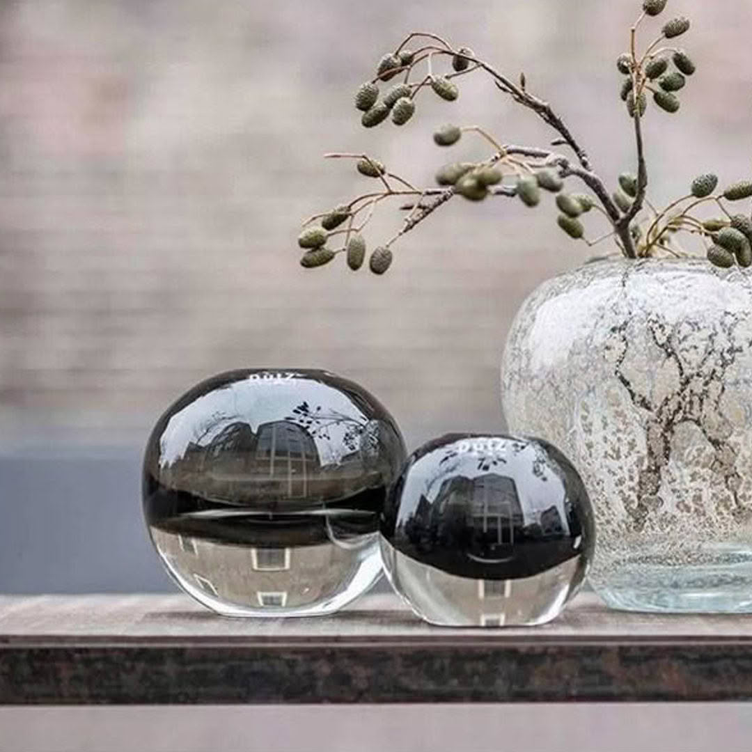 dutz-hoola-grey-2 Glass spheres reflecting buildings with vase and twigs