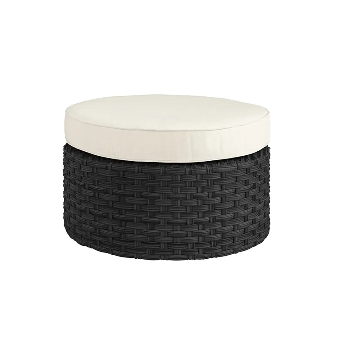 Round black wicker ottoman with white cushion