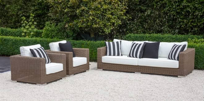 Outdoor rattan furniture set with striped cushions