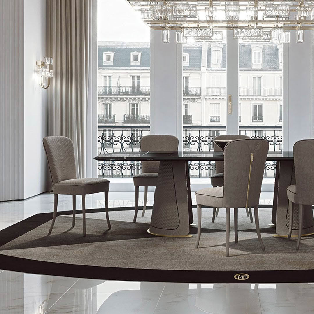 Elegant dining room with balcony view and chandelier