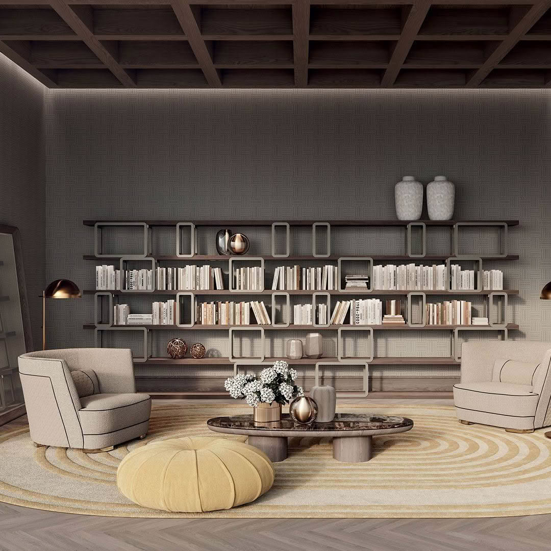 Elegant living room with extensive bookshelves and cozy seating
