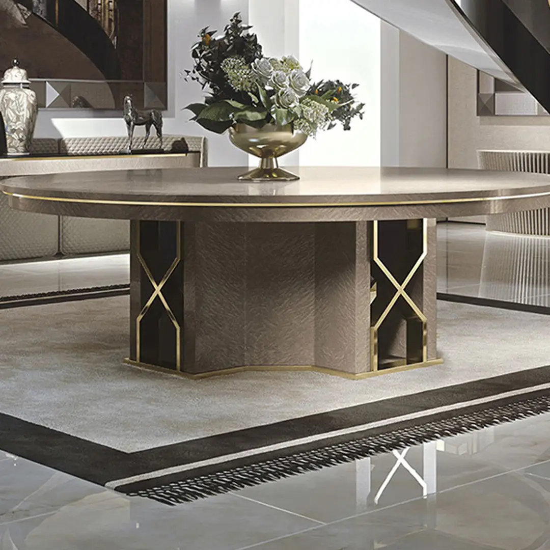 Luxurious oval dining table with golden accents and vase