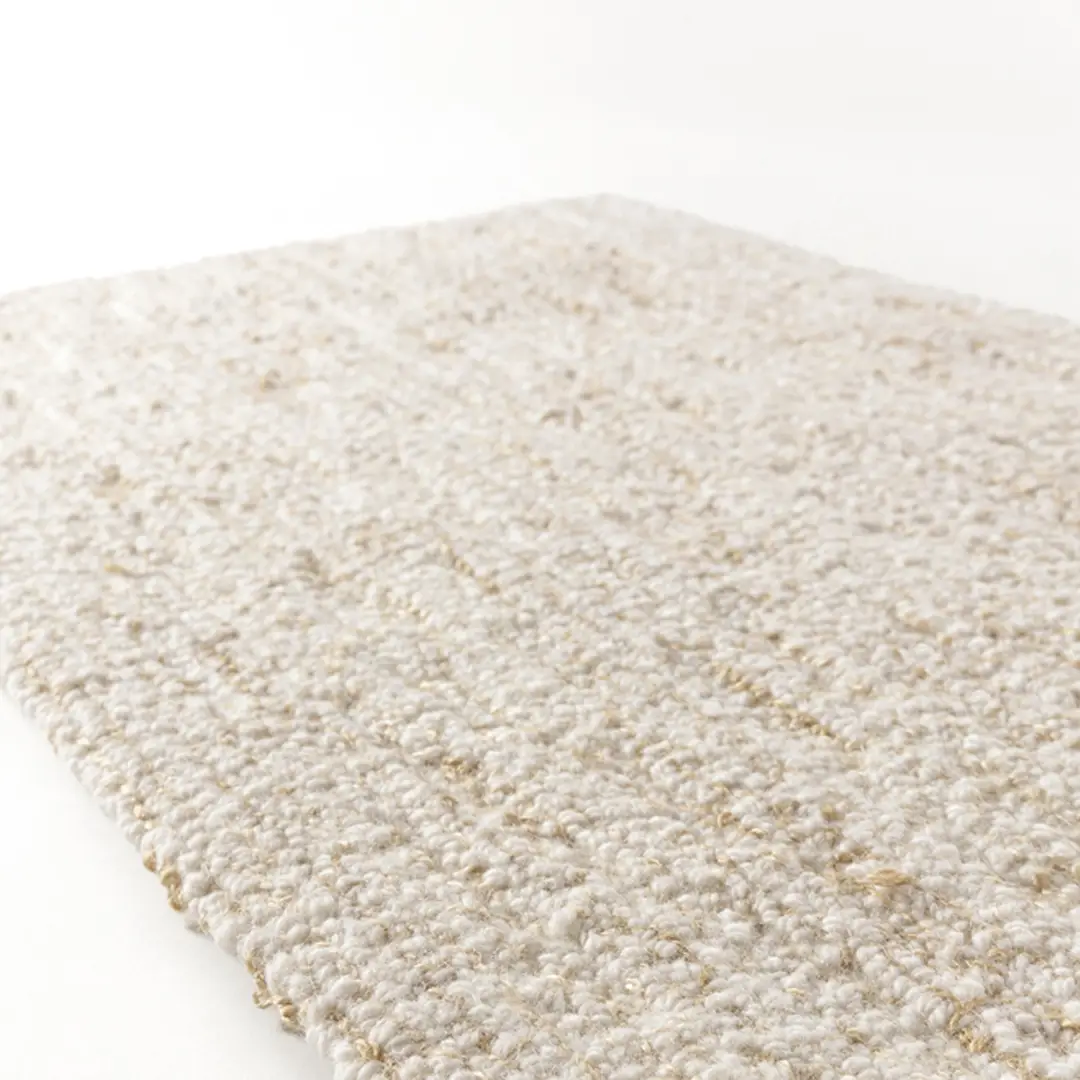 Close-up of textured beige wool carpet