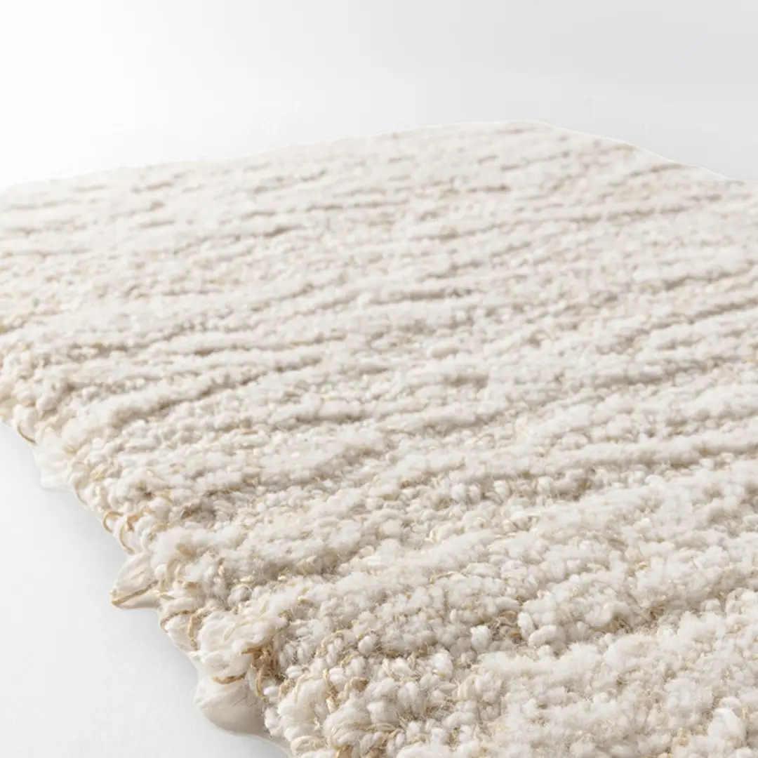 Close-up of textured white shag rug