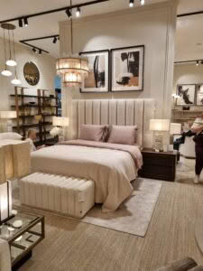 Elegant bedroom display with chandelier and modern decor