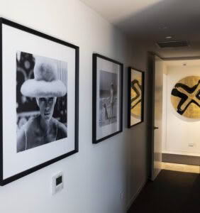 Gallery wall with framed black and white portraits
