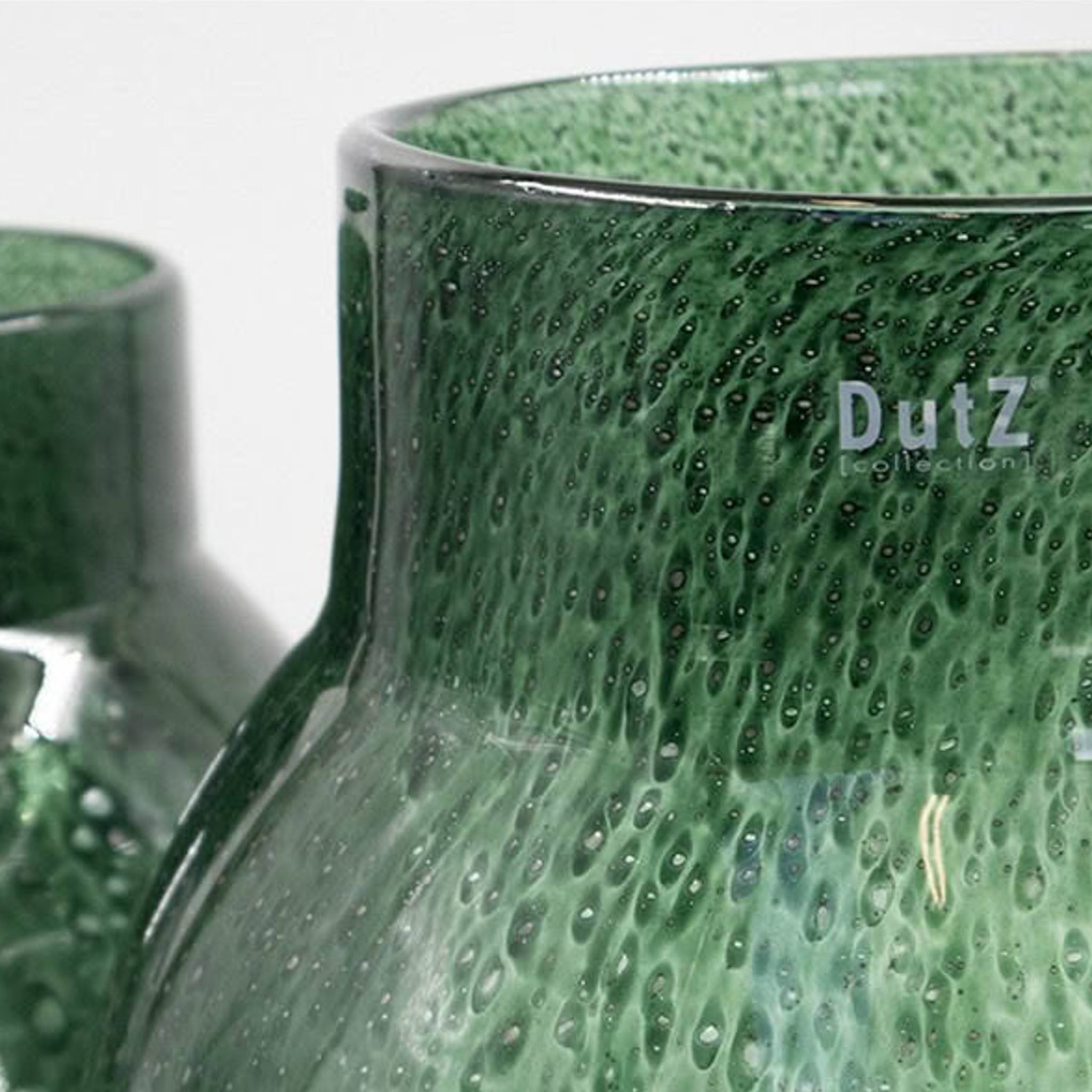 DUTZ-Breb-darkgreen_3 Close-up of textured green glass vase with watermark