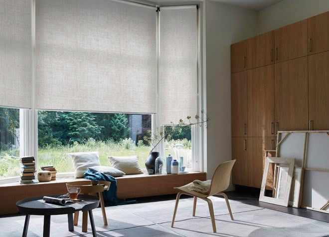 Modern living room with large window and minimalist decor