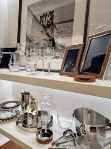Elegant home decor and tableware on display shelf