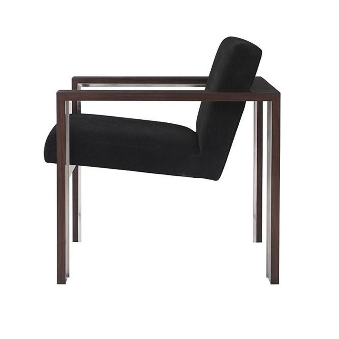 Modern black armchair with wooden frame and clean lines