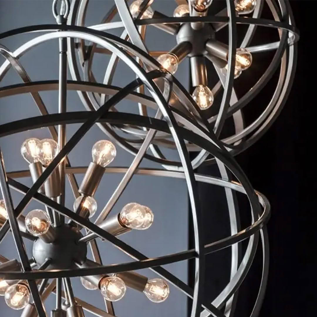 Modern spherical chandelier with lit bulbs
