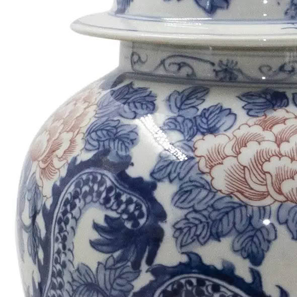 Close-up of blue and white floral ceramic vase