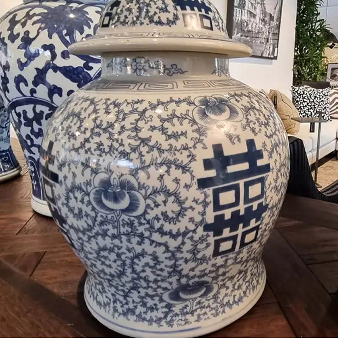 Large blue and white ceramic vase with floral patterns