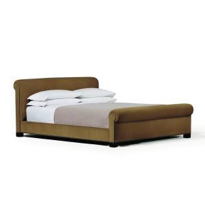 Elegant brown upholstered bed with white bedding