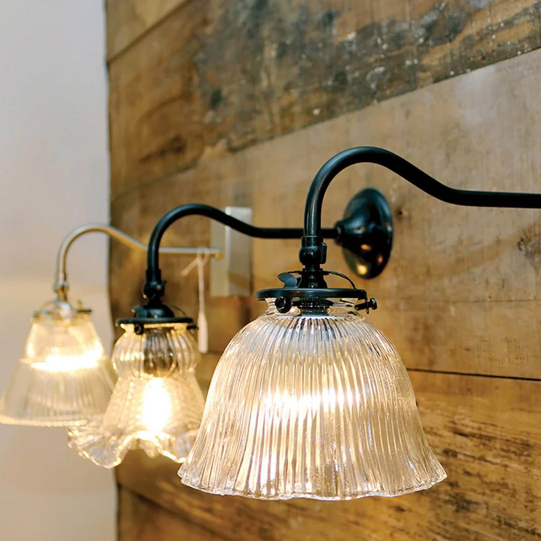 Vintage wall-mounted lights with ribbed glass shades