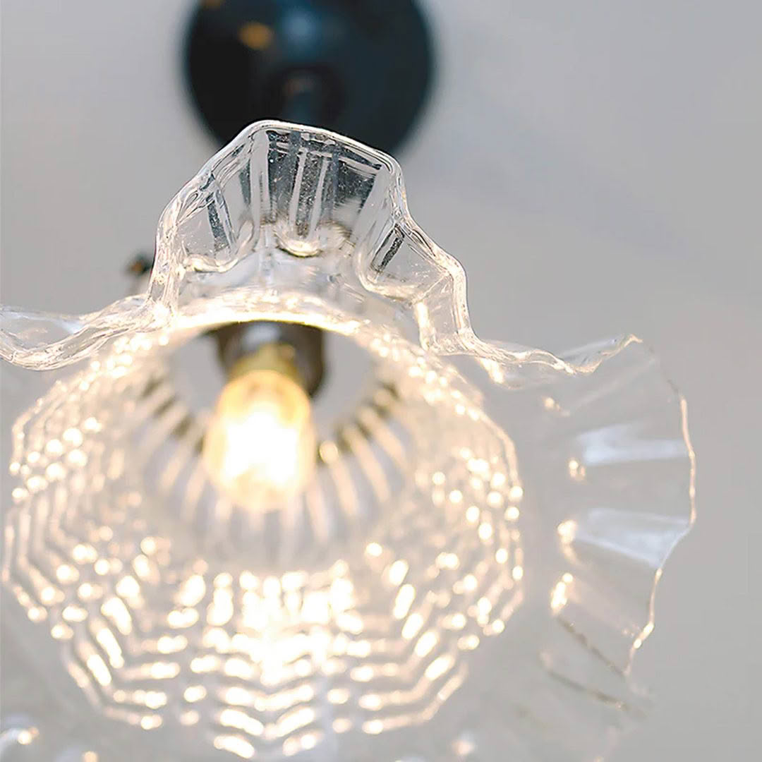 Close-up of illuminated crystal light fixture