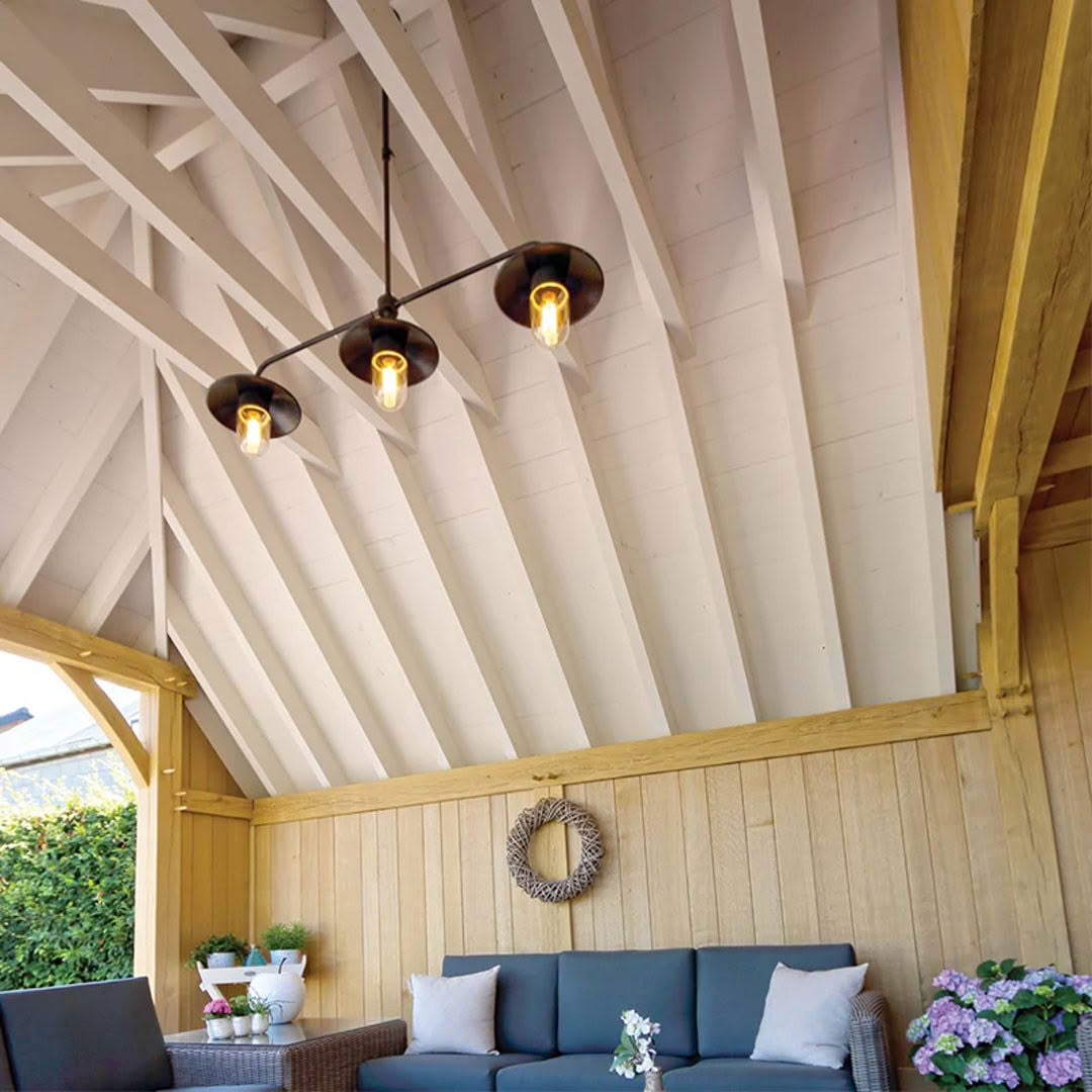 Cozy patio setup with modern lighting and plush seating