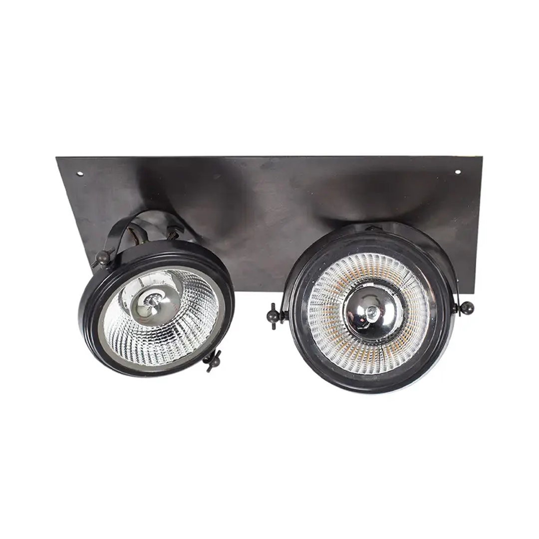 Dual circular mounted spotlights on black panel