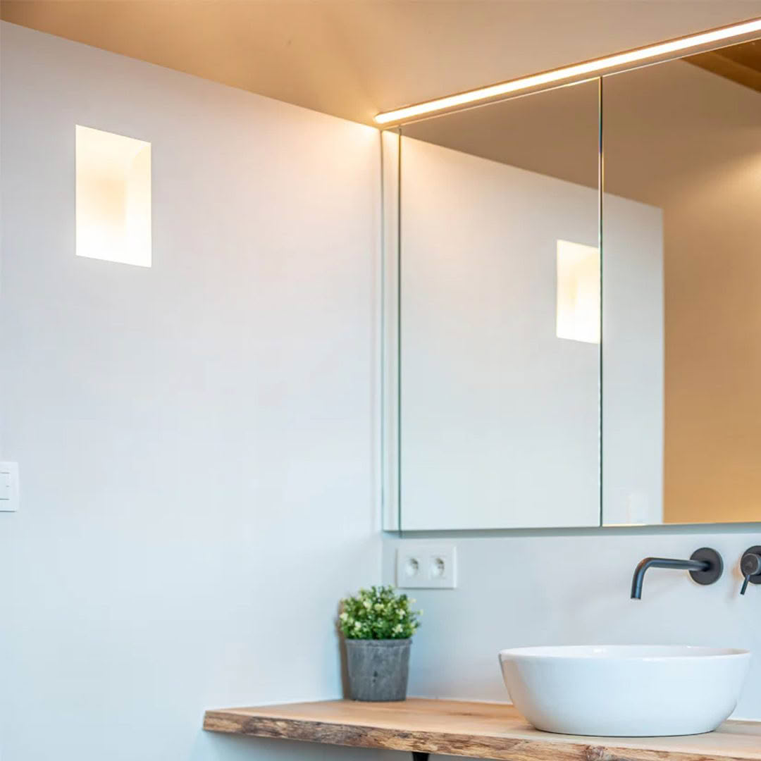 Modern bathroom with mirror and white vessel sink