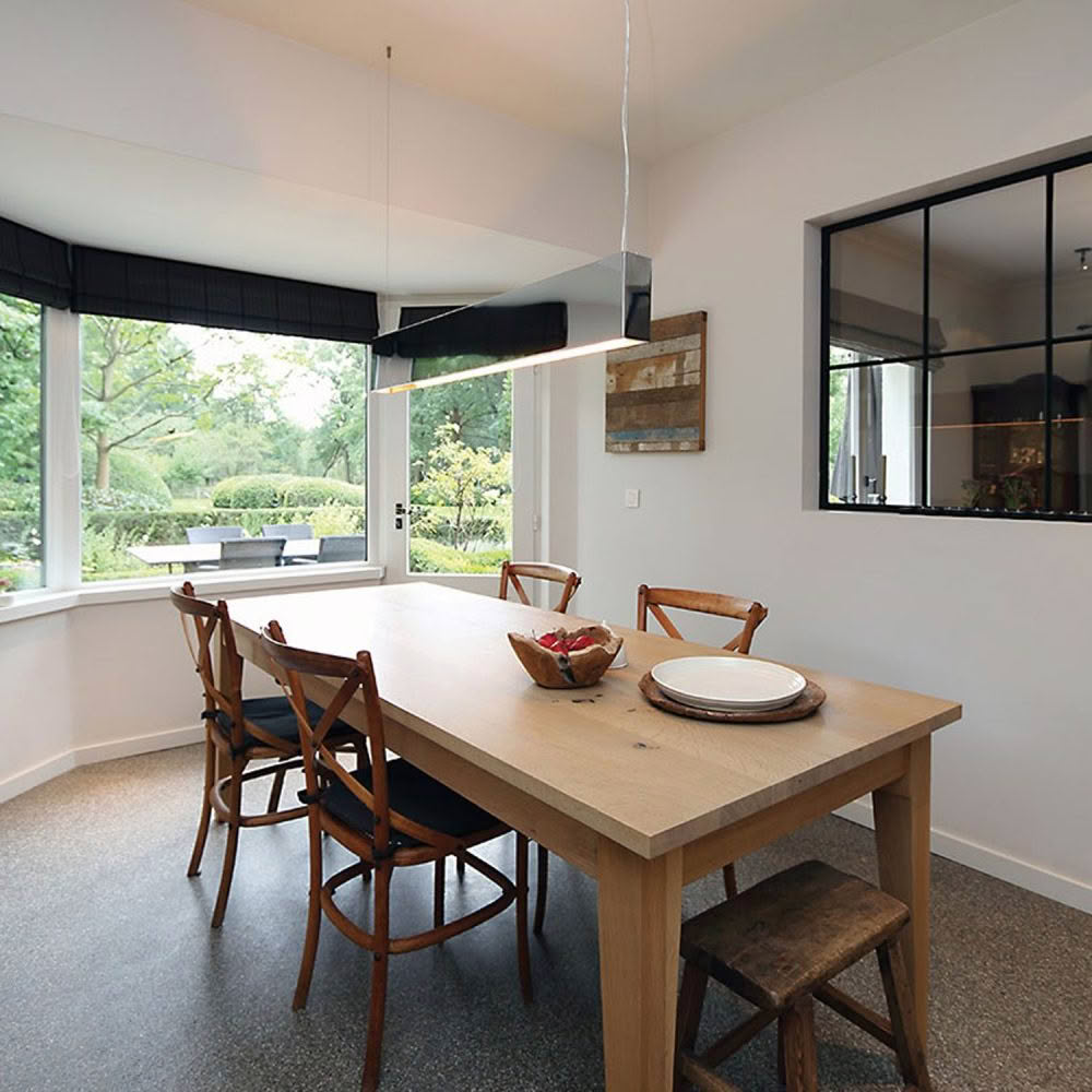 Modern dining room with garden view
