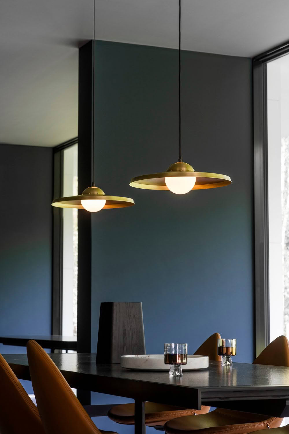 Modern dining room with stylish pendant lights