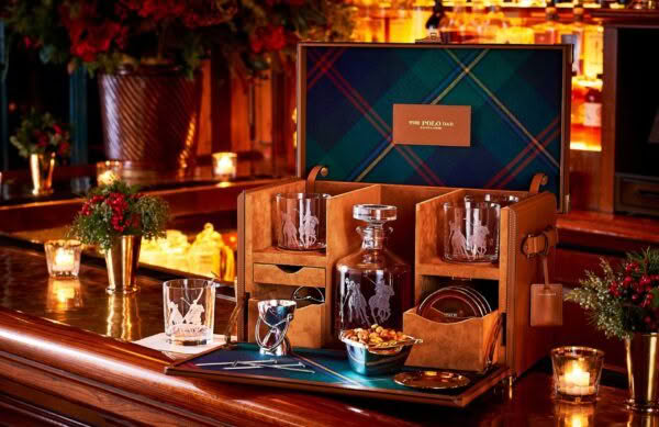 Elegant whiskey set in a leather travel case on bar