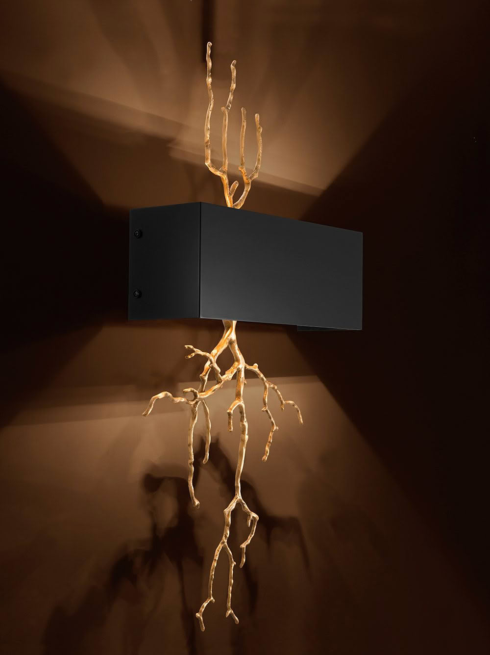 Modern wall-mounted light with abstract branch design