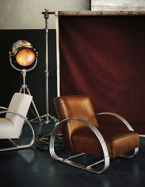 Modern interior with chrome chair and vintage spotlight