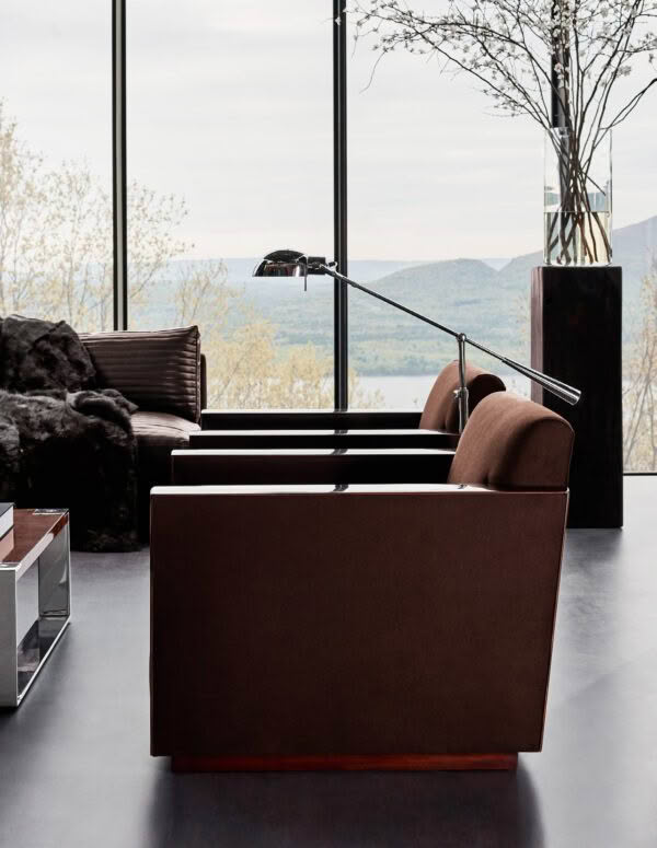 Modern interior with scenic lake view through large window