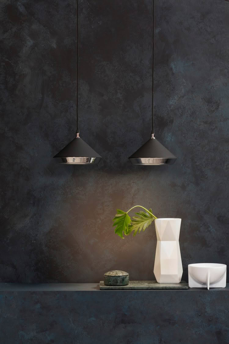 Modern interior with pendant lights and decorative items