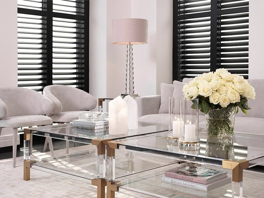 Elegant living room with modern furniture and floral decoration