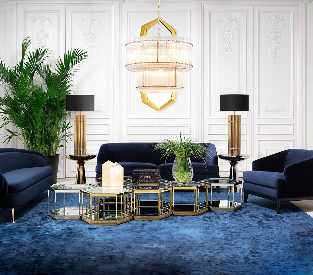 Elegant living room with blue sofas and luxury chandelier