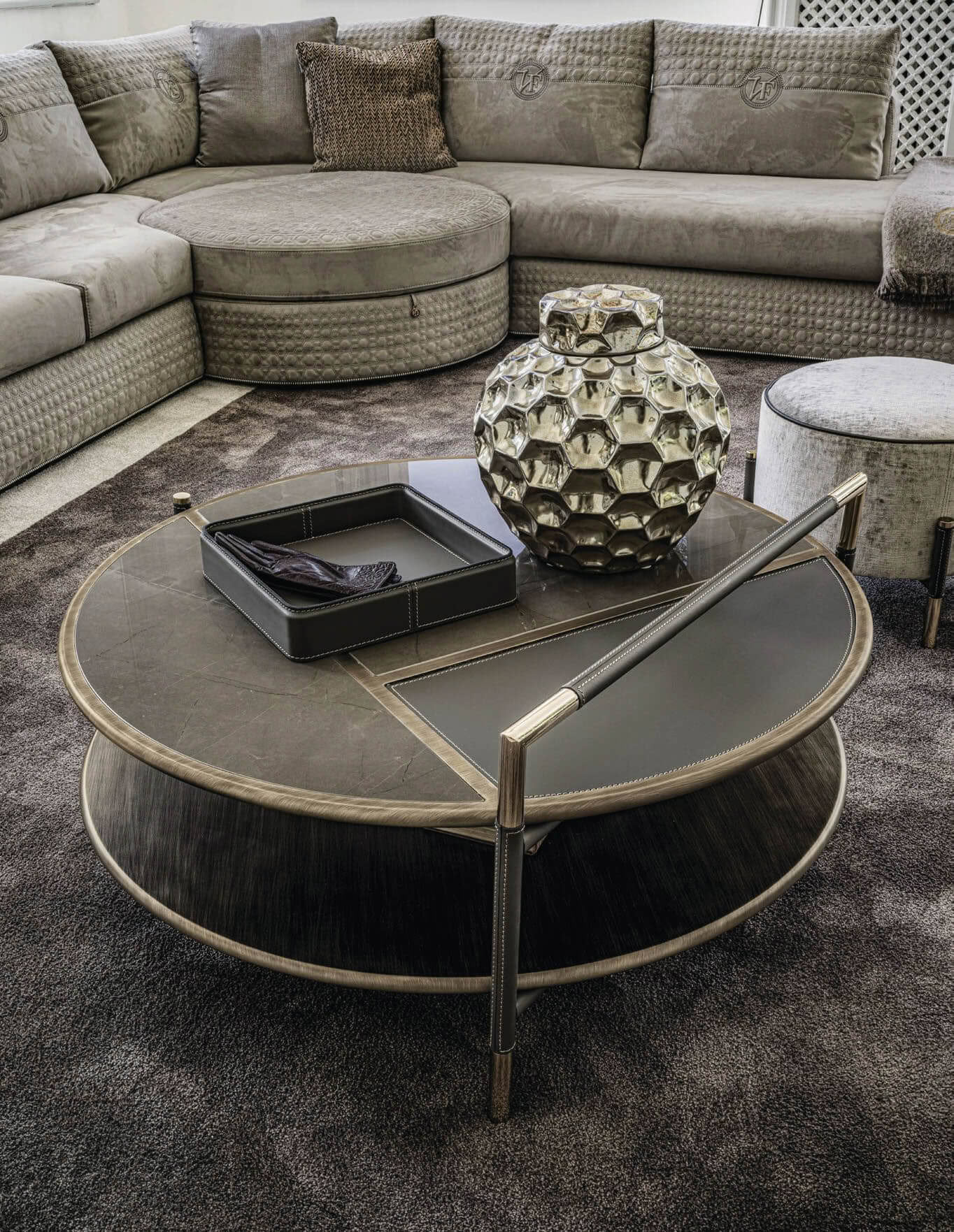 Luxury living room with sectional sofa and round coffee table