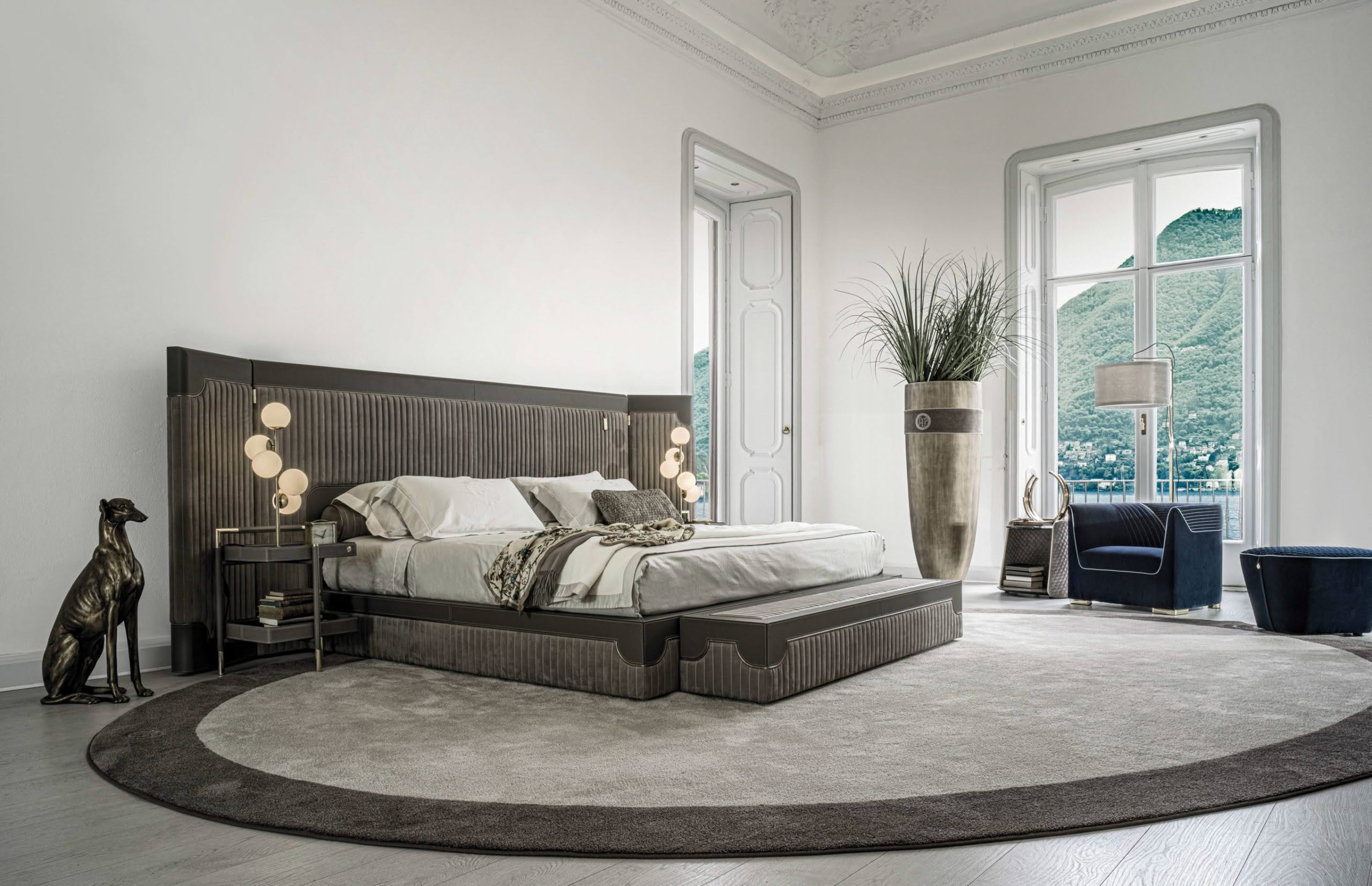 Elegant bedroom with mountain view through large window