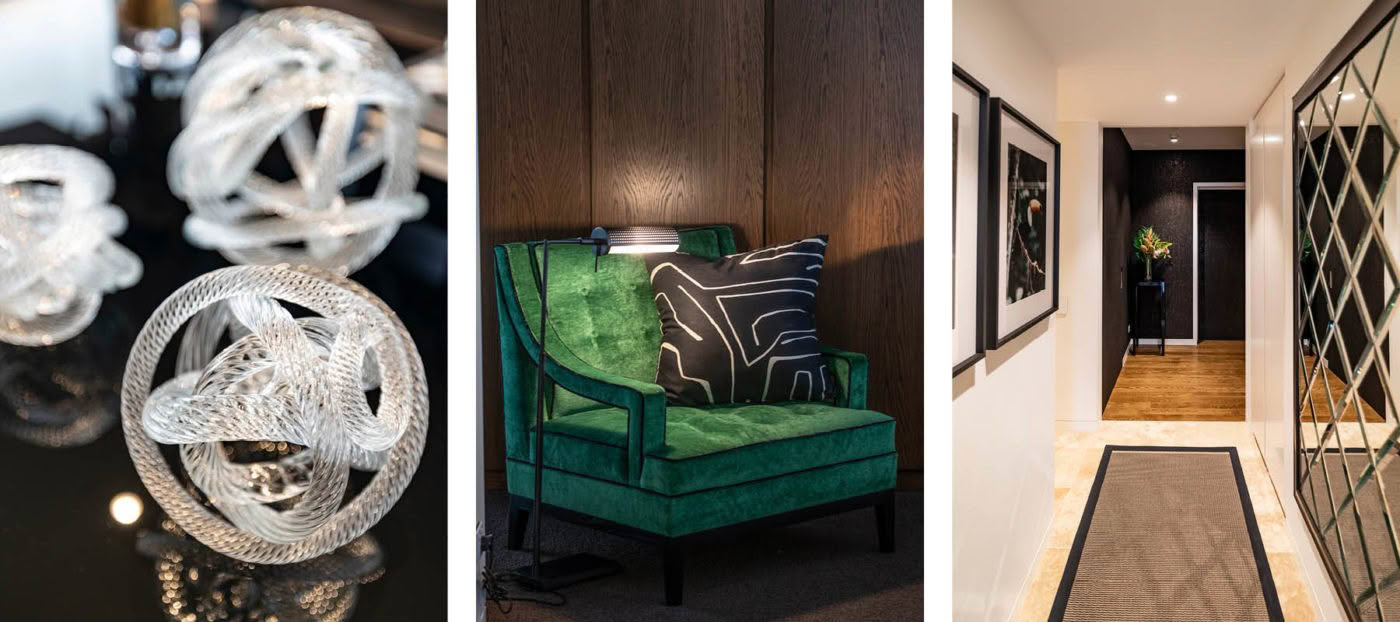 Glass sculptures, green velvet chair, elegant hallway