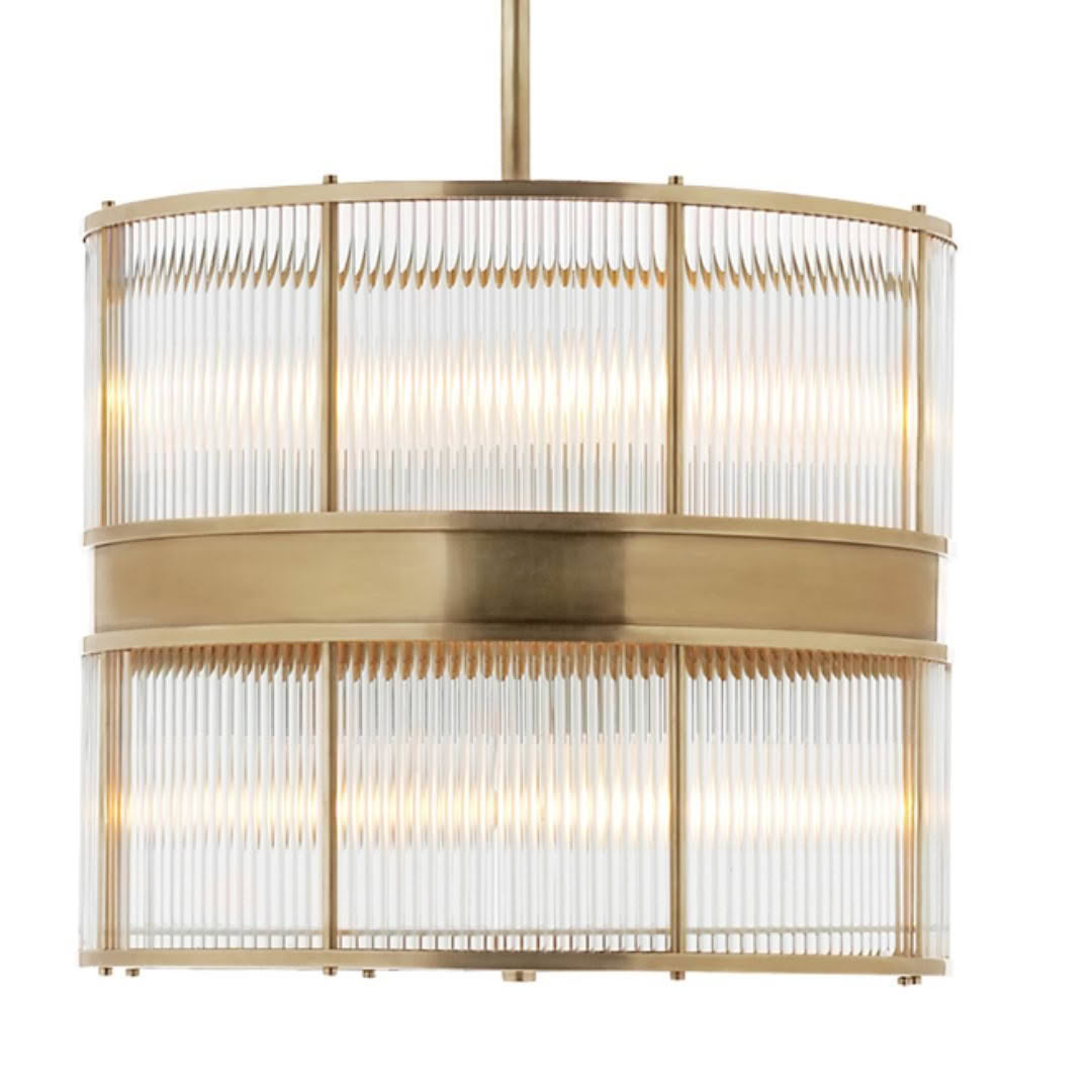 Gold chandelier with vertical ribbed glass panels