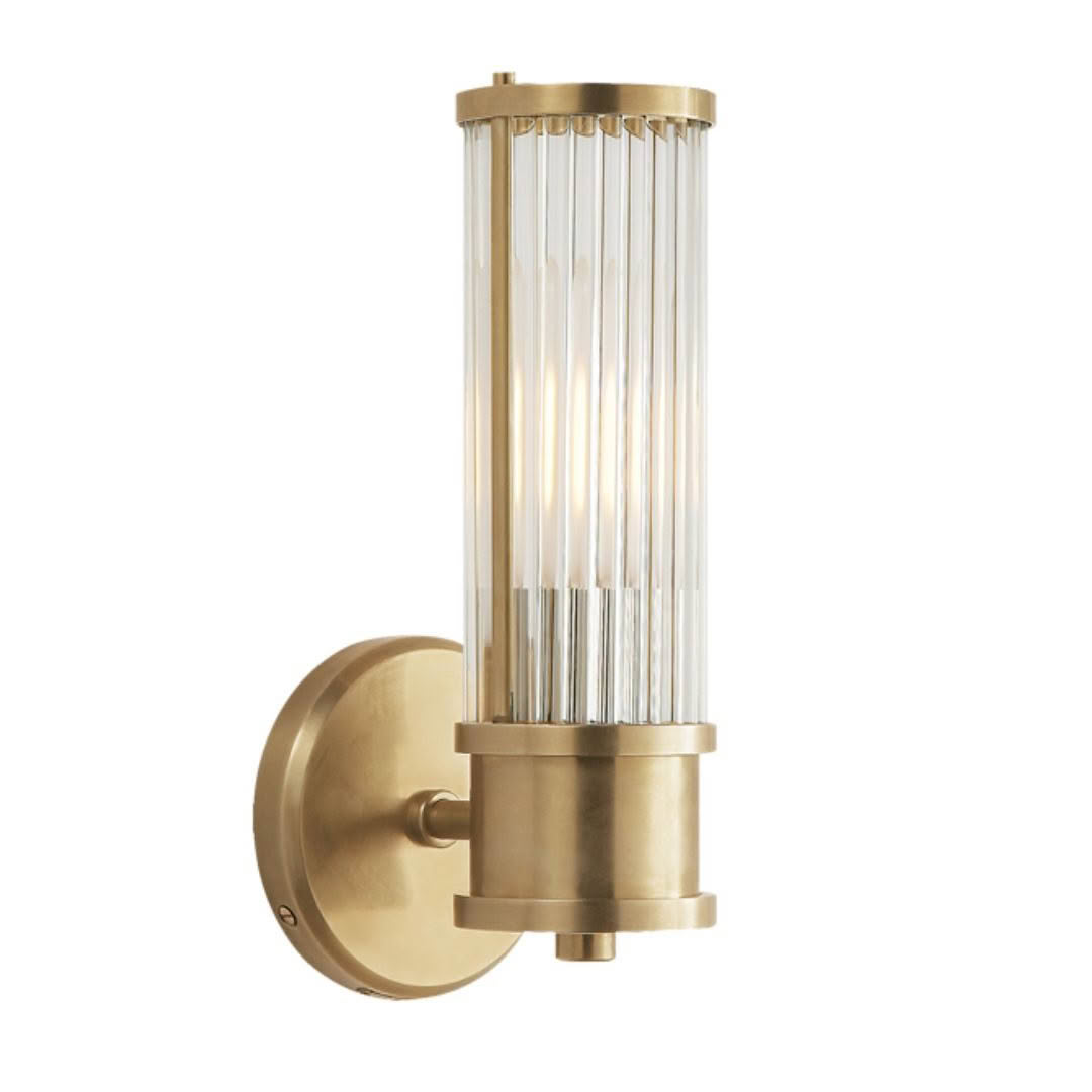 Gold wall-mounted cylindrical light fixture