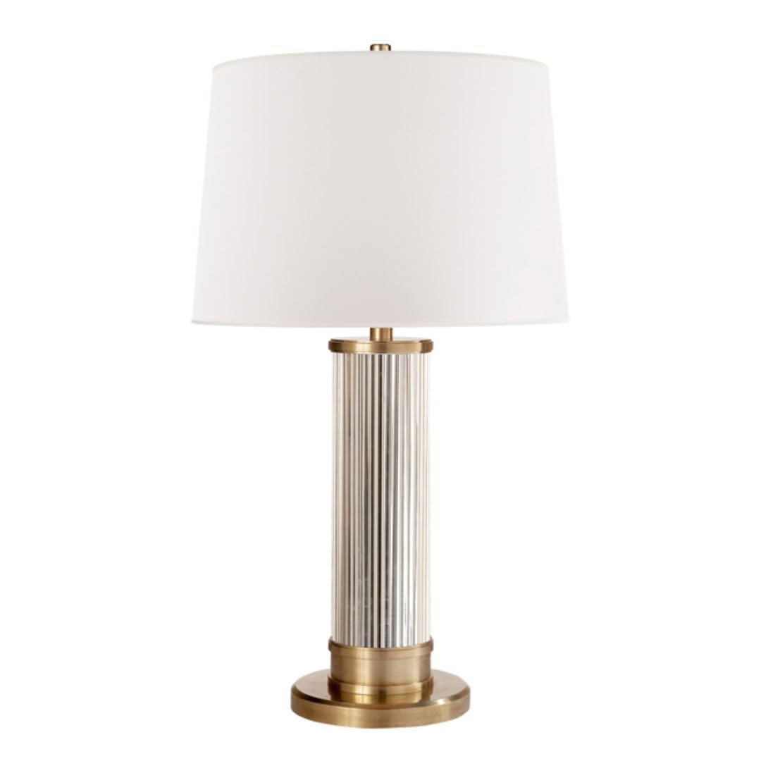 Elegant gold and white table lamp with ridged base