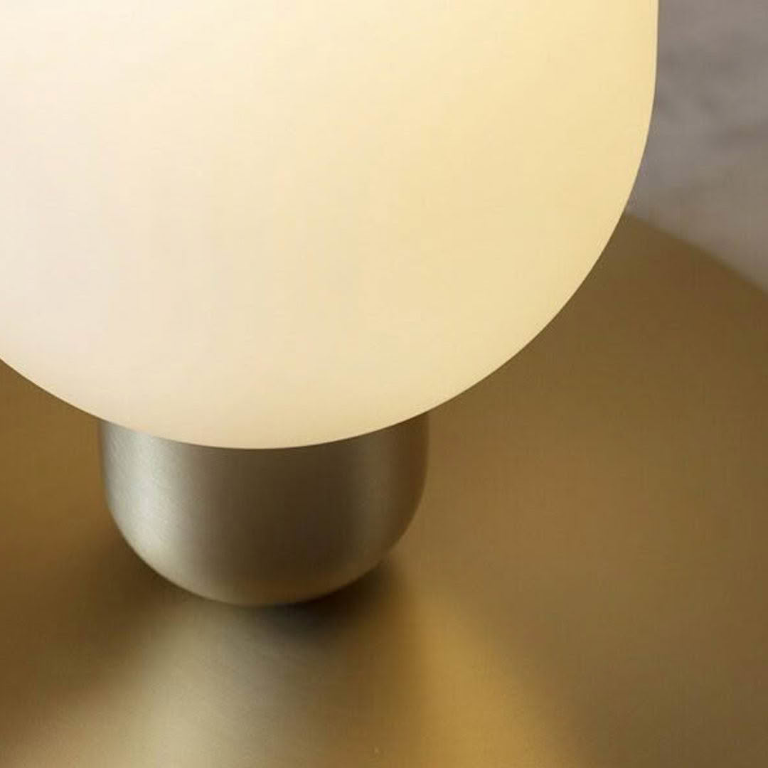 Modern table lamp with illuminated round shade