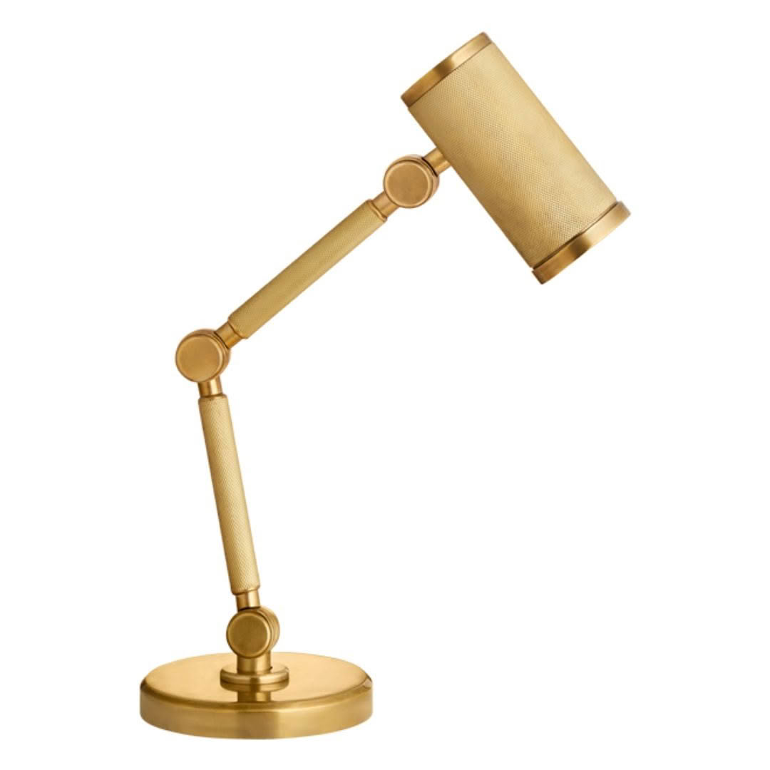 Gold adjustable desk lamp isolated on white