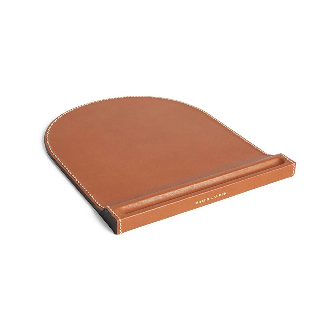 Brown leather desk blotter with stitched edges