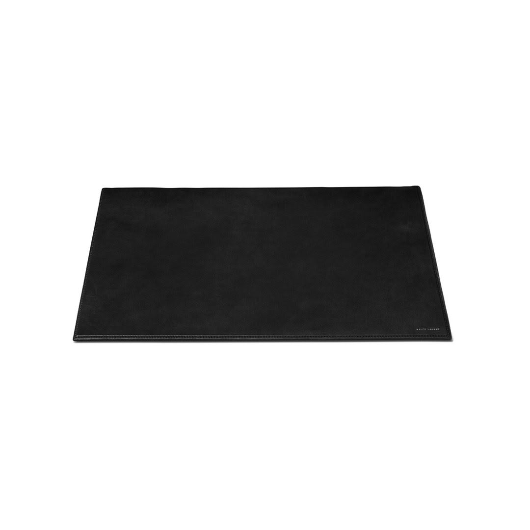 Black desk mat on white background