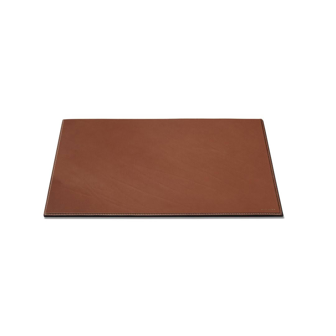 Brown leather desk mat with stitching