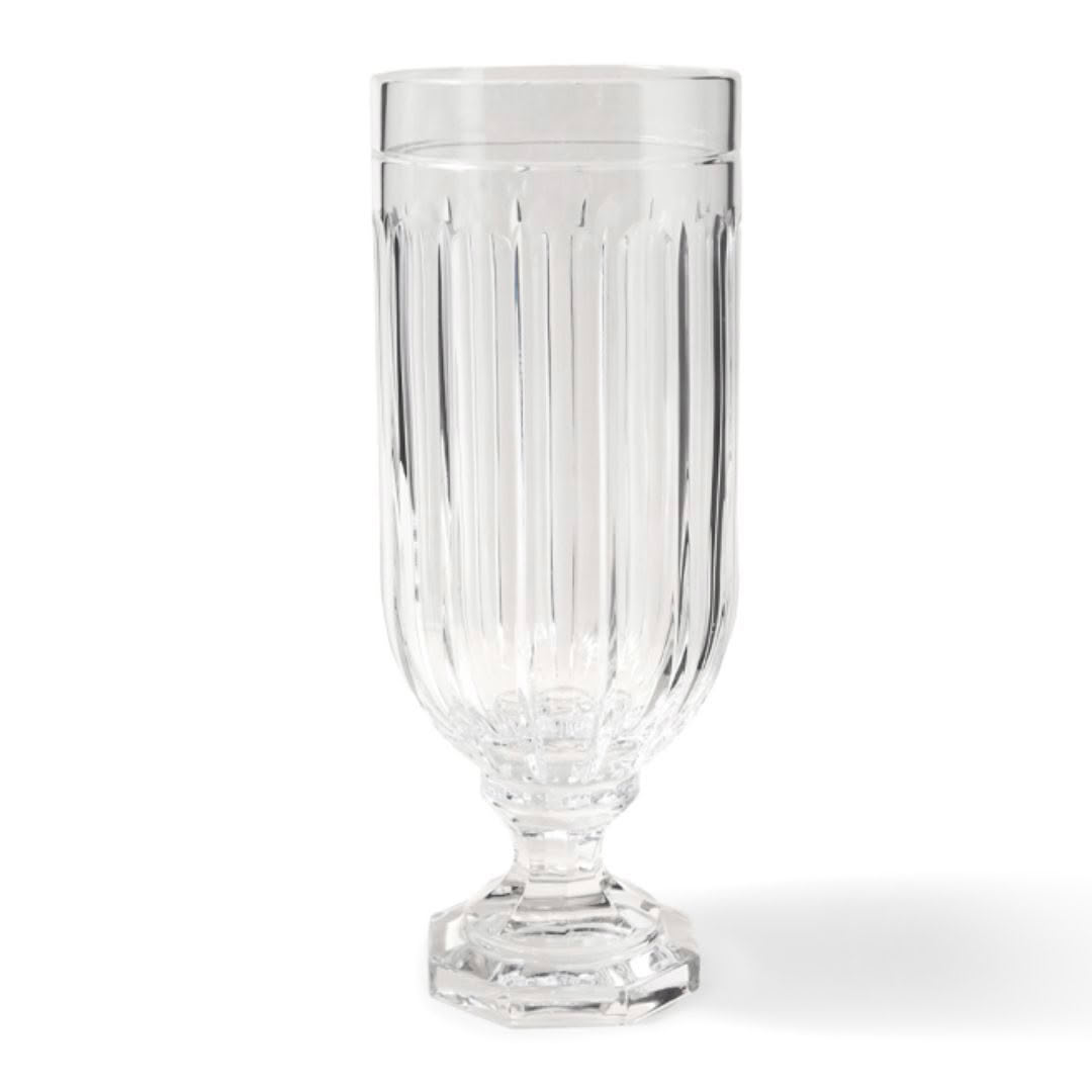 Clear glass with vertical ridges on white background