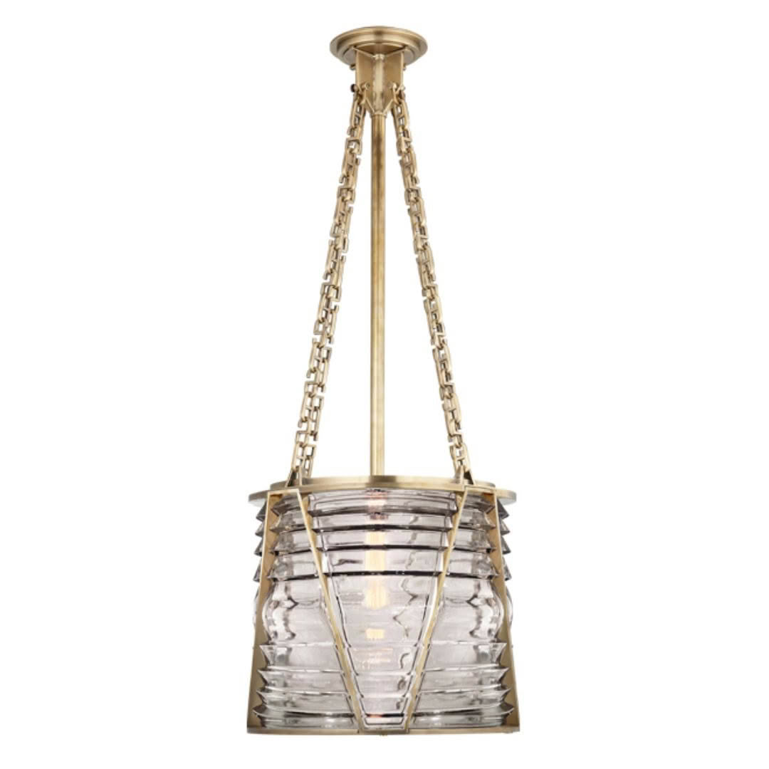 Elegant brass pendant light with crystal accents